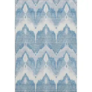 Photo of Denim Blue And Ivory Ikat Washable Area Rug With UV Protection