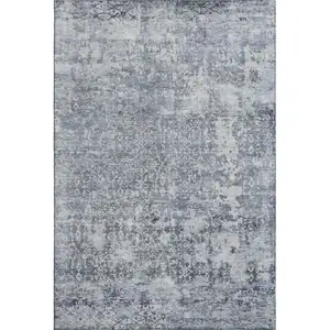 Photo of Denim Blue And Ivory Oriental Washable Area Rug With UV Protection