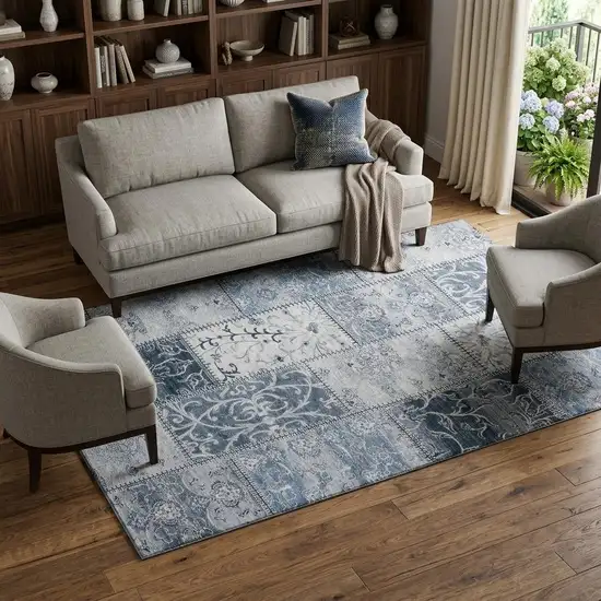 Denim Blue And Ivory Patchwork Distressed Washable Area Rug With UV Protection Photo 1