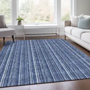 Photo of Denim Blue And Ivory Striped Washable Area Rug With UV Protection