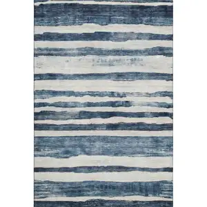 Photo of Denim Blue And Ivory Striped Washable Area Rug With UV Protection