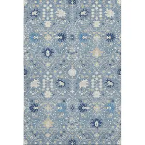 Photo of Denim Blue Beige And Ivory Oriental Washable Area Rug With UV Protection