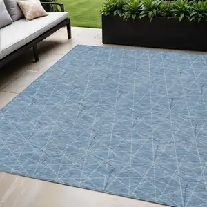 Photo of Denim Blue Black And Ivory Geometric Washable Indoor Outdoor Area Rug