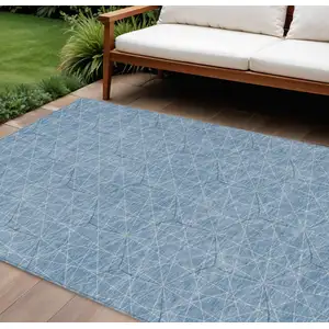 Photo of Denim Blue Black And Ivory Geometric Washable Indoor Outdoor Area Rug