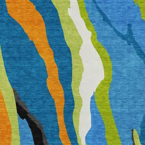 Photo of Denim Blue Copper And Green Abstract Washable Indoor Outdoor Area Rug