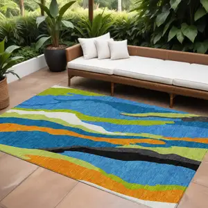 Photo of Denim Blue Copper And Green Abstract Washable Indoor Outdoor Area Rug