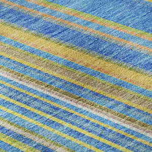Photo of Denim Blue Gold And Lime Green Striped Washable Area Rug With UV Protection