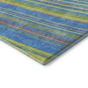 Photo of Denim Blue Gold And Lime Green Striped Washable Area Rug With UV Protection