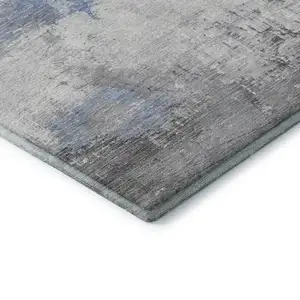 Photo of Denim Blue Gray And Ivory Abstract Washable Area Rug With UV Protection