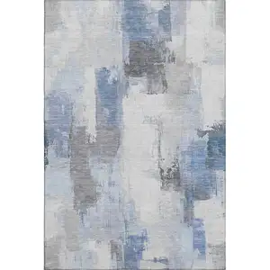 Photo of Denim Blue Gray And Ivory Abstract Washable Area Rug With UV Protection