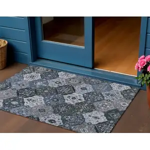 Photo of Denim Blue Gray And Ivory Floral Medallion Washable Indoor Outdoor Area Rug