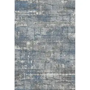 Photo of Denim Blue Gray And Ivory Geometric Washable Area Rug With UV Protection