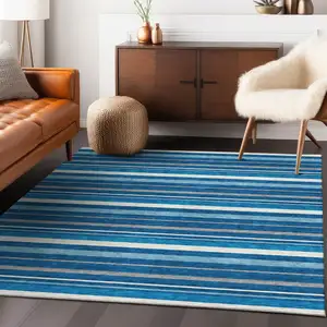 Photo of Denim Blue Gray And Ivory Striped Washable Indoor Outdoor Area Rug
