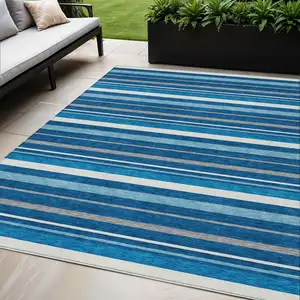 Photo of Denim Blue Gray And Ivory Striped Washable Indoor Outdoor Area Rug