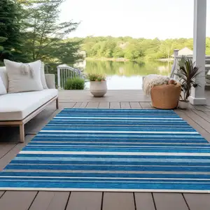 Photo of Denim Blue Gray And Ivory Striped Washable Indoor Outdoor Area Rug