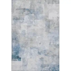 Photo of Denim Blue Gray And Silver Abstract Washable Area Rug With UV Protection
