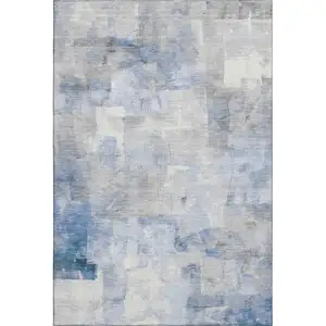 Photo of Denim Blue Gray And Silver Abstract Washable Area Rug With UV Protection