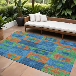 Photo of Denim Blue Green And Copper Geometric Washable Indoor Outdoor Area Rug