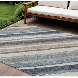 Photo of Denim Blue Ivory And Beige Striped Washable Indoor Outdoor Area Rug