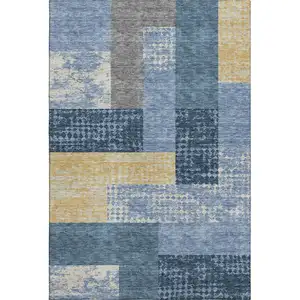 Photo of Denim Blue Ivory And Gold Geometric Washable Area Rug With UV Protection