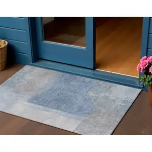 Photo of Denim Blue Ivory And Gray Abstract Washable Indoor Outdoor Area Rug