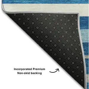 Photo of Denim Blue Ivory And Gray Striped Washable Area Rug With UV Protection