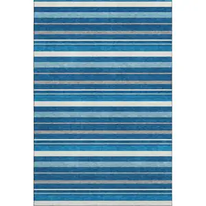 Photo of Denim Blue Ivory And Gray Striped Washable Area Rug With UV Protection