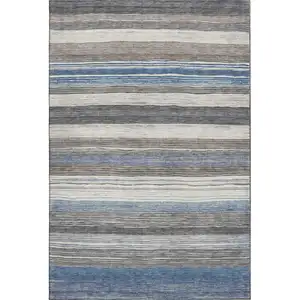 Photo of Denim Blue Ivory And Gray Striped Washable Area Rug With UV Protection