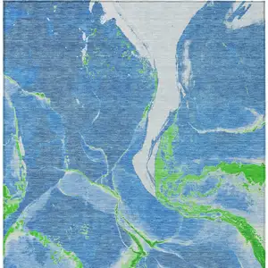 Photo of Denim Blue Neon Green And Ivory Abstract Washable Indoor Outdoor Area Rug