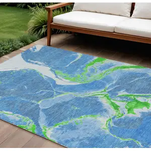 Photo of Denim Blue Neon Green And Ivory Abstract Washable Indoor Outdoor Area Rug