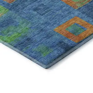 Photo of Denim Blue Orange And Green Geometric Washable Area Rug With UV Protection
