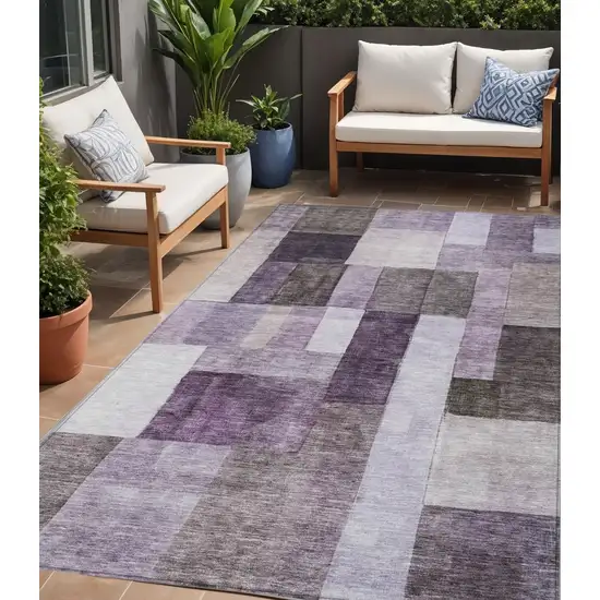 Eggplant Black And Lavender Geometric Washable Indoor Outdoor Area Rug Photo 1