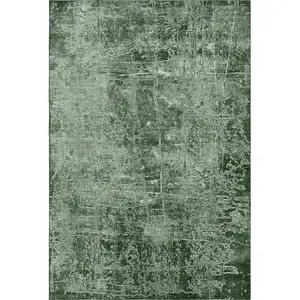 Photo of Emerald And Ivory Abstract Washable Area Rug With UV Protection