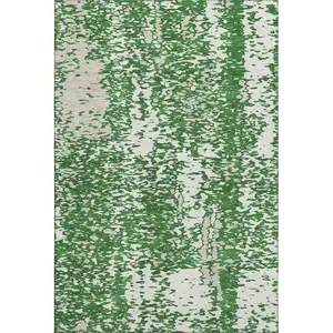 Photo of Emerald And Ivory Abstract Washable Area Rug With UV Protection