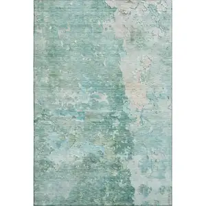 Photo of Emerald Pale Aqua And Ivory Abstract Washable Area Rug With UV Protection