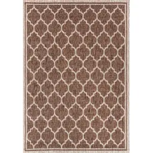 Photo of Espresso And Taupe Geometric Indoor Outdoor Area Rug