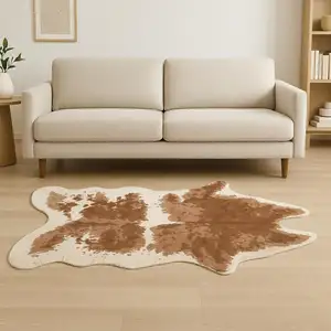 Photo of Faux Cow Hide Brown And Ivory Area Rug