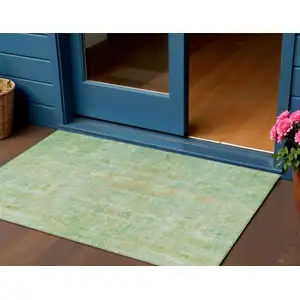 Photo of Fern Green And Copper Abstract Washable Indoor Outdoor Area Rug