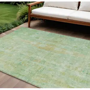 Photo of Fern Green And Copper Abstract Washable Indoor Outdoor Area Rug