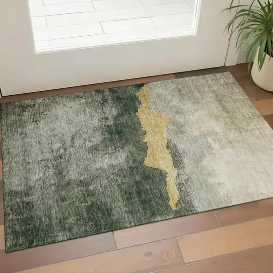 Fern Green And Gold Abstract Washable Area Rug With UV Protection Photo 1