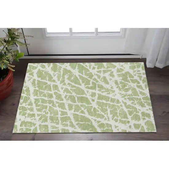 Fern Green And Ivory Abstract Washable Area Rug With UV Protection Photo 2