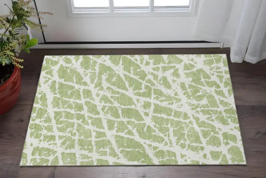 Fern Green And Ivory Abstract Washable Area Rug With UV Protection Photo 2