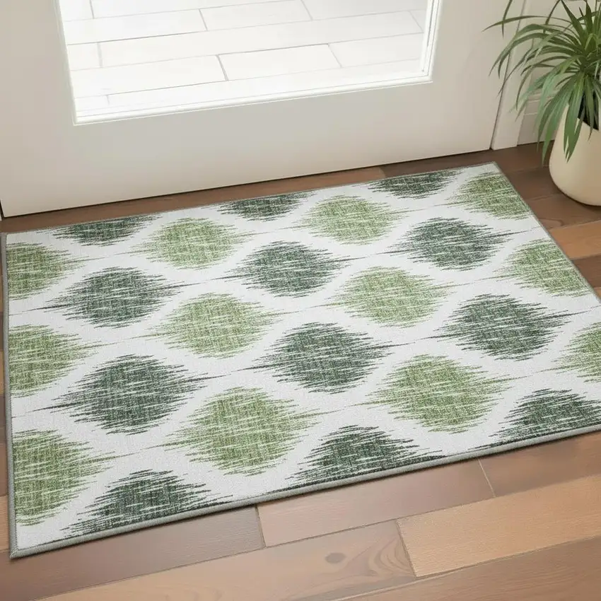 Fern Green And Ivory Ikat Washable Area Rug With UV Protection Photo 2