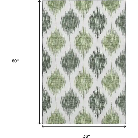 Fern Green And Ivory Ikat Washable Area Rug With UV Protection Photo 3