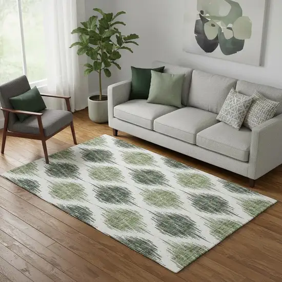Fern Green And Ivory Ikat Washable Area Rug With UV Protection Photo 1