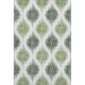 Photo of Fern Green And Ivory Ikat Washable Area Rug With UV Protection