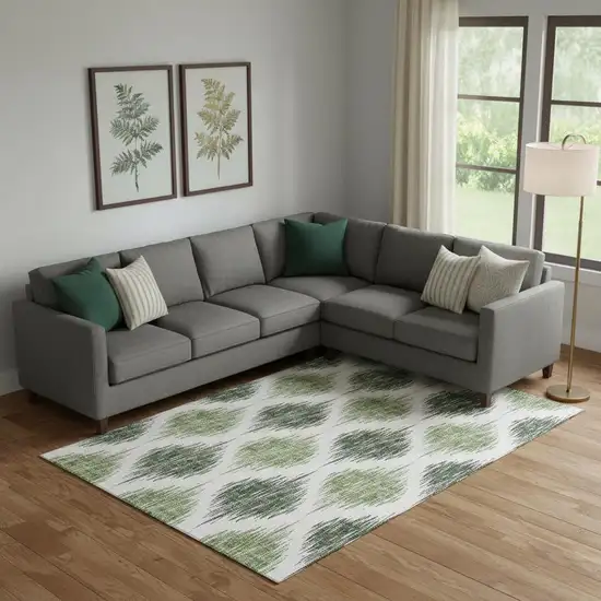 Fern Green And Ivory Ikat Washable Area Rug With UV Protection Photo 1