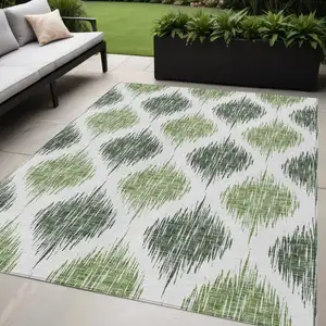 Photo of Fern Green And Ivory Ikat Washable Indoor Outdoor Area Rug