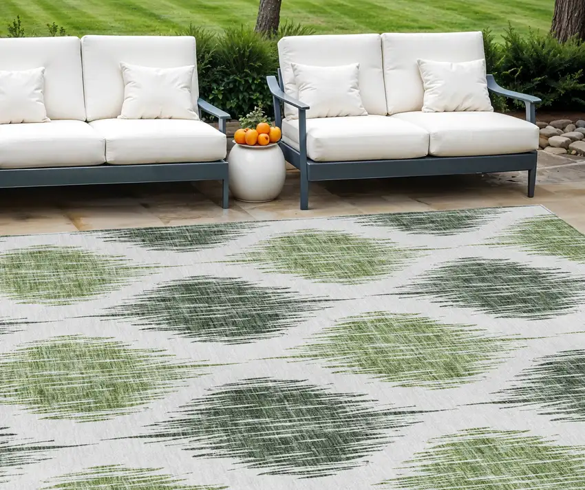 Fern Green And Ivory Ikat Washable Indoor Outdoor Area Rug Photo 1