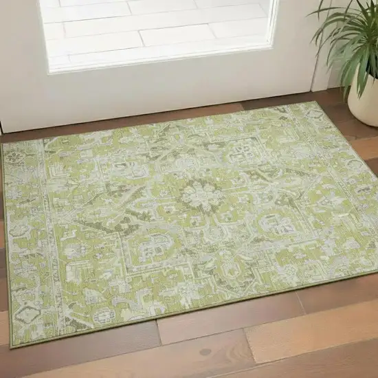 Fern Green And Ivory Oriental Washable Area Rug With UV Protection Photo 1